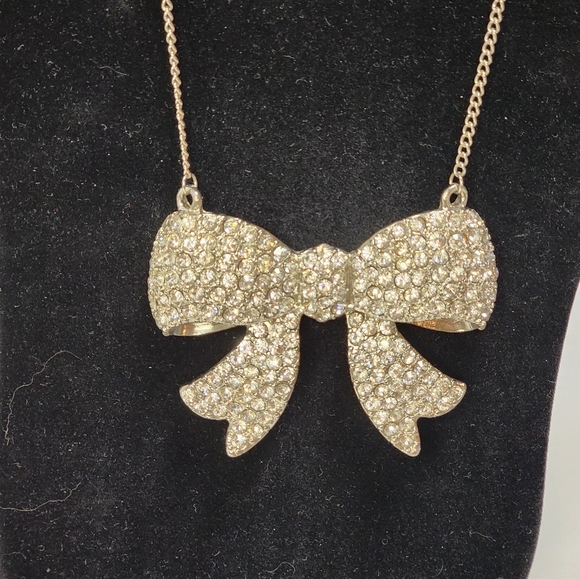 Fashion Forward Large Rhinestone and Silver Bow Pendant Necklace - Picture 11 of 11